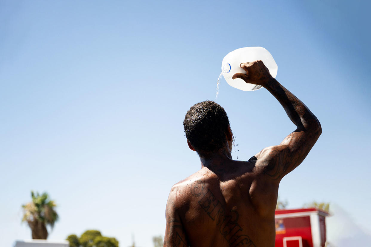 Man cooling off in heat wave Brandon Bell/Getty Images