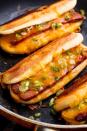 <p>Oh yes we did combine two of your favorite things!</p><p>Get the recipe from <a href="https://www.delish.com/cooking/recipe-ideas/recipes/a52599/grilled-cheese-dogs-recipe/" rel="nofollow noopener" target="_blank" data-ylk="slk:Delish;elm:context_link;itc:0;sec:content-canvas" class="link ">Delish</a>.</p>