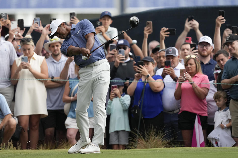 Tiger Woods hits his tee shot on the 13th hole during a practice round for the U.S. Open golf tournament Monday, June 10, 2024, in Pinehurst, N.C. (AP Photo/Matt York)