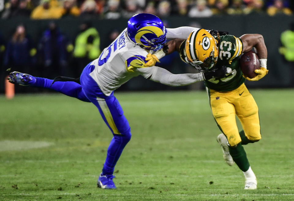 Green Bay Packers pull away from the Los Angeles Rams, advance to