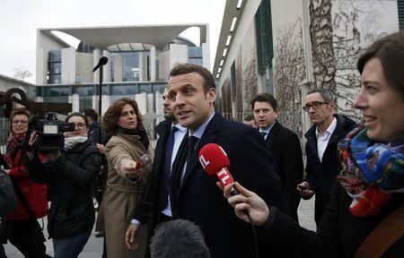 Emmanuel Macron, head of the political movement En Marche ! (or Onwards !) and candidate for the 2017 presidential election leaves the Chancellery after a meeting with German Chancellor Angela Merkel in Berlin, Germany, March 16, 2017. REUTERS/Fabrizio Bensch