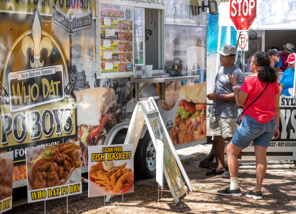 Foodies check out the festivities during a previous Pensacola Habitat Food Truck Festival.