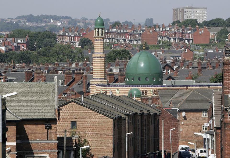 <b>LEEDS, UNITED KINGDOM:</b> The Leeds Grand Central Mosque looms above the city's Burley area.