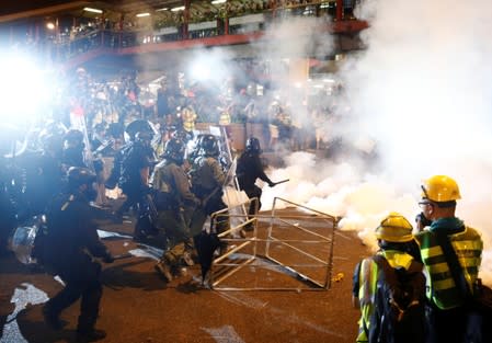 Riot police move, after a march to call for democratic reforms in Hong Kong