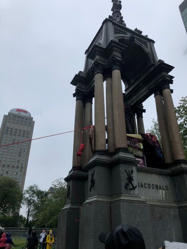 Statue of Canada's first PM Macdonald is pulled down by demonstrators during a protest against racial inequality, in Montreal, Quebec