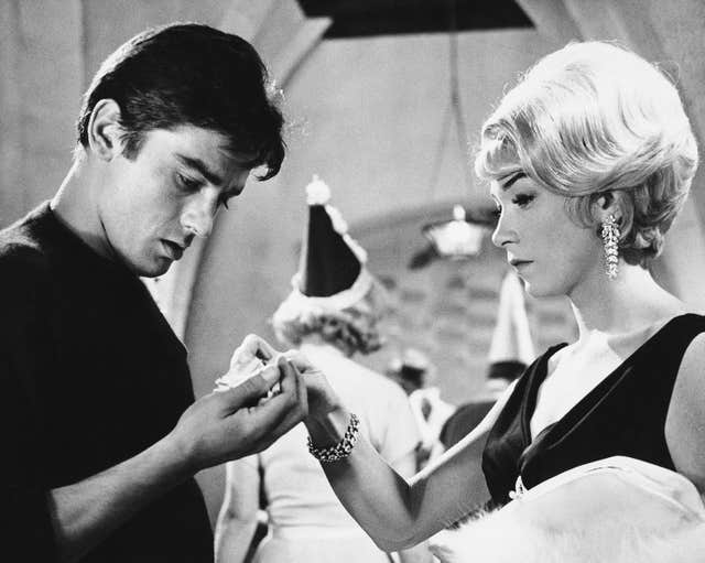 With US actress Shirley MacLaine on the set of the film The Yellow Rolls-Rovce in 1964