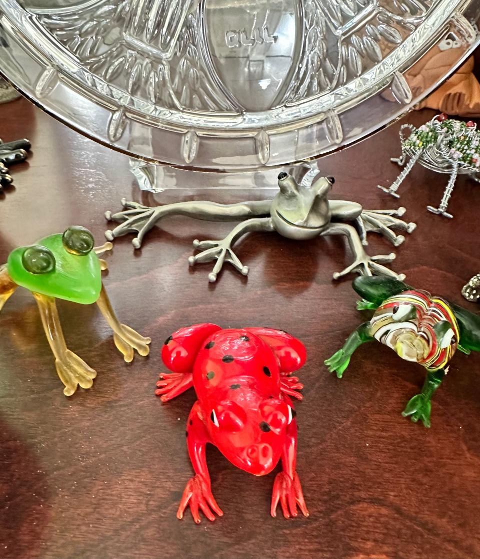 A ceramic frog collection representing one of the 10 plagues is displayed during Passover at the home of Rabbi John Spitzer and his wife, Cheri.