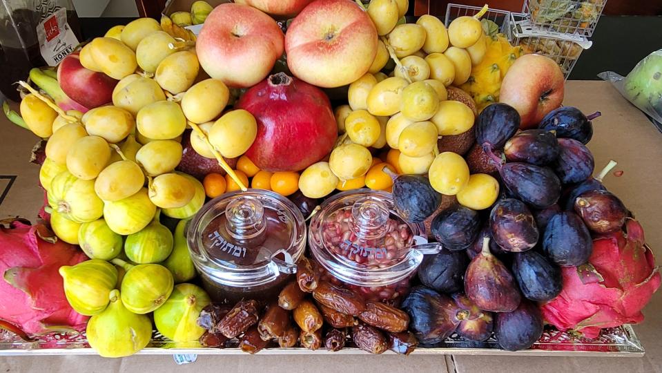 A fruit platter prepared by Lakewood chef Berish Rapaport for Rosh Hashanah contains dragonfruit, figs, pomegranate, apples and fresh dates.