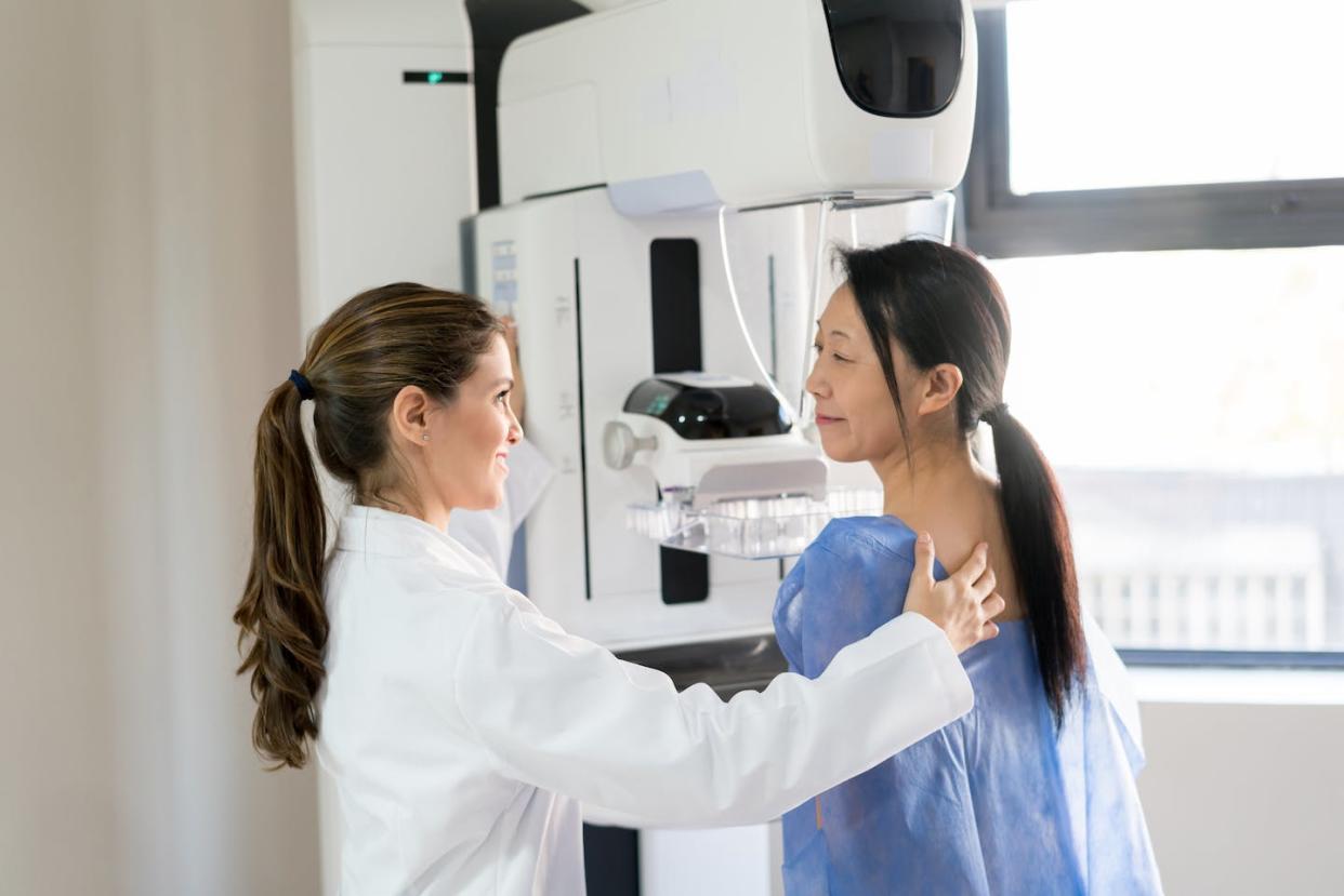 Breast density is one of the factors that can influence whether people should pursue supplemental screening. <a href="https://www.gettyimages.com/detail/photo/female-doctor-talking-to-her-patient-and-adjusting-royalty-free-image/1221770065?phrase=mammogram&adppopup=true" rel="nofollow noopener" target="_blank" data-ylk="slk:andresr/E+ via Getty Images;elm:context_link;itc:0;sec:content-canvas" class="link ">andresr/E+ via Getty Images</a>