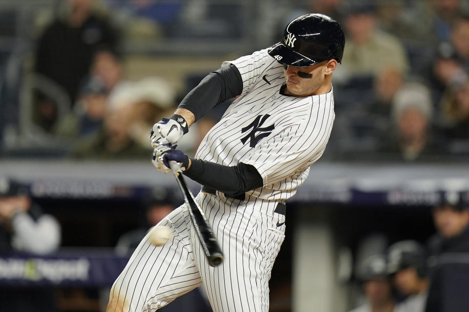 New York Yankees Anthony Rizzo (48) connects for an RBI base hit against the Houston Astros during the fourth inning of Game 4 of an American League Championship baseball series, Sunday, Oct. 23, 2022, in New York. (AP Photo/Seth Wenig)