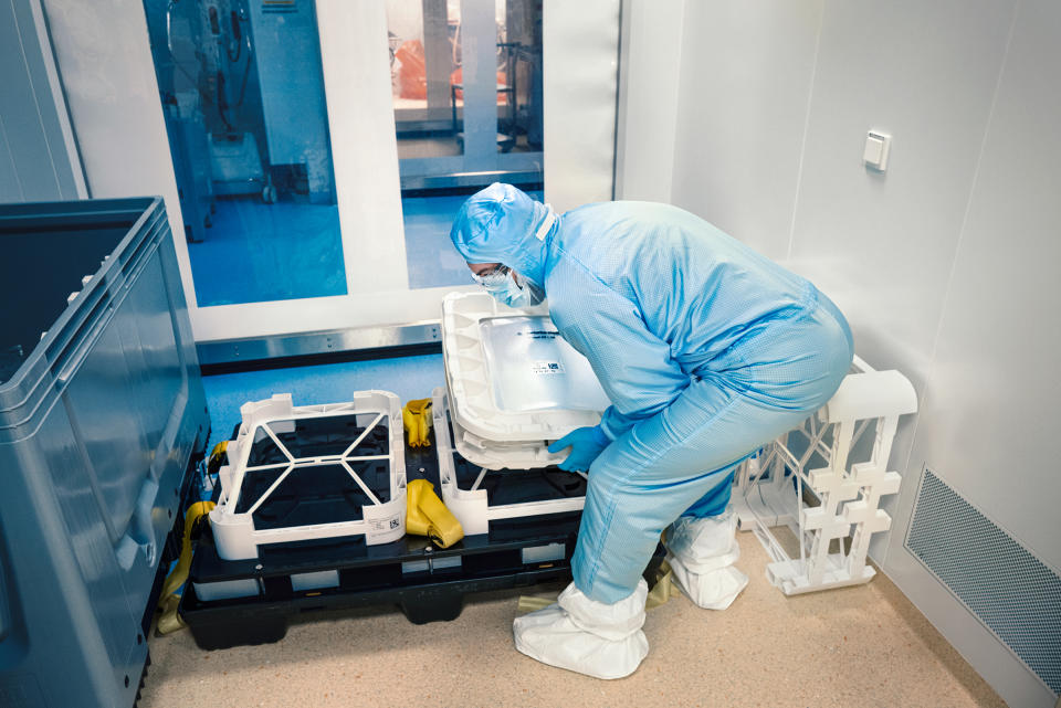 Lab technician Nabil Jajila is responsible for moving the bags of finished vaccines in bulk to the pallets that will eventually be shipped to another facility for putting into vials.<span class="copyright">Luca Locatelli for TIME</span>