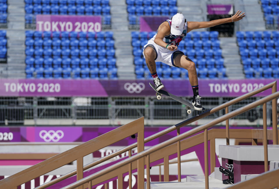 FILE - In this July 25, 2021, file photo, Jagger Eaton, of the United States, competes in men's street Skateboarding during the Tokyo Olympics in Tokyo, Japan. In arenas across Tokyo, athletes accustomed to feeding off the deafening roar of the crowd are searching for new ways to feel Olympic enthusiasm. Eaton found mood booster in the phone he occasionally fished out of his right pocket while competing to change the music. (Nathan Denette/The Canadian Press via AP, File)