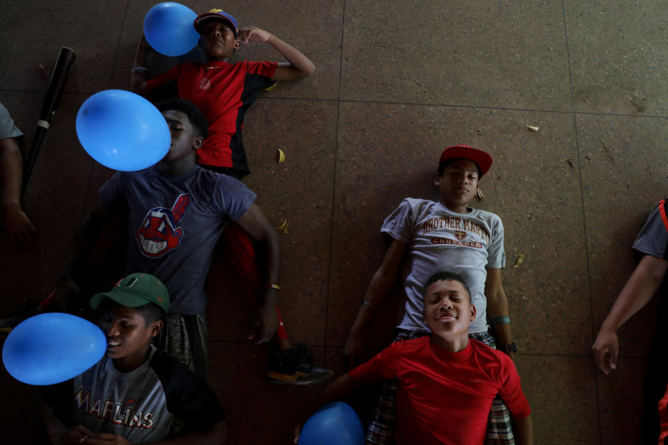 Baseball little league players Ibrahim Ruiz, 13 (bottom right), and Adrian Salcedo, 13 (top right), take part in a psychological therapy session at Diamonds Prospect baseball academy in Maracaibo, Venezuela.  (Photo: Manaure Quintero/Reuters)