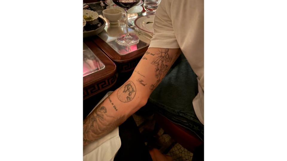 Romeo now has Mia's nickname "Mooch" tatood on his arm