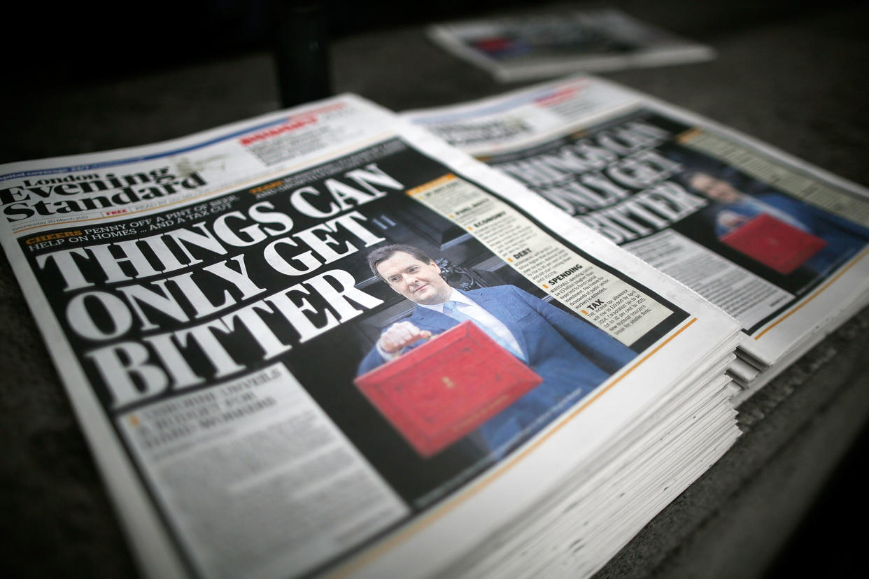 LONDON, ENGLAND - MARCH 20:  The London Evening Standards carries a front page story on the Chancellor George Osborne's budget, which was leaked on the paper's Twitter account, prior to the Chancellor's Commons statement on March 20, 2013 in London, England. The Chancellor is under pressure after the UK lost its AAA credit rating last month and the lack of growth in the economy, is predicted to reveal plans to continue with his austerity strategy to cut the UK's deficit. It is likely that Mr. Osborne will announce further spending cuts to Whitehall departments with the savings put in place to boost large scale infrastructure projects, with both tax breaks on childcare and a rise in fuel duty also high on the agenda.  (Photo by Matthew Lloyd/Getty Images)