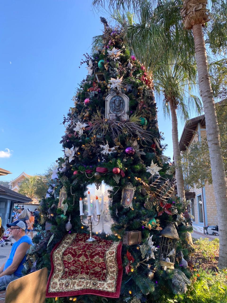 A Haunted Mansion tree at Disney Springs in December 2021.