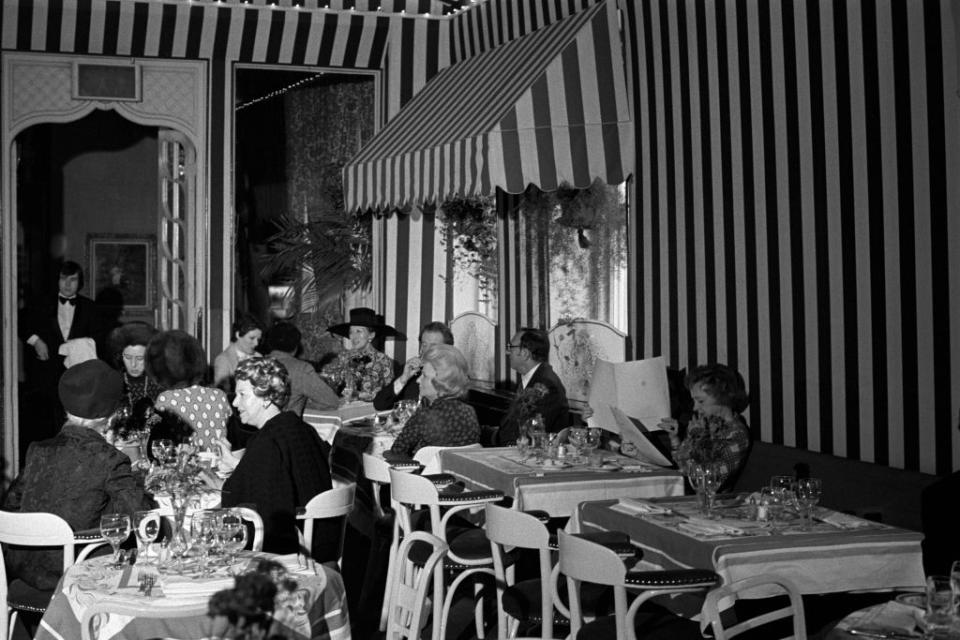 Diners eating at The Colony Restaurant on the day of its reopening. (Photo by Sal Traina/WWD/Penske Media via Getty Images)