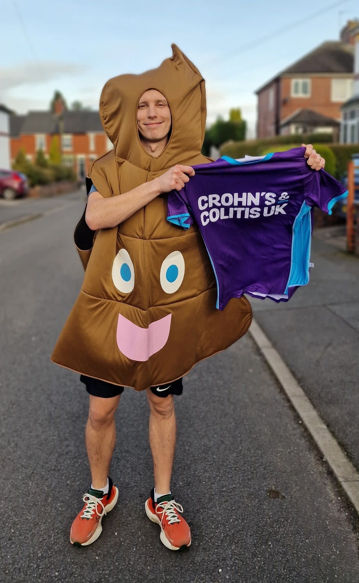 Tom Hall will be running the London Marathon dressed as a giant poo emoji (JustGiving)