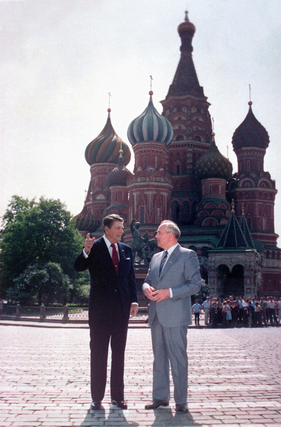 FILE - U.S. President Ronald Reagan, left, and Soviet leader Mikhail Gorbachev talk during their walk in Red Square, with St. Basil's Cathedral in the background, in Moscow, Soviet Union, Tuesday, May 31, 1988. Russian news agencies are reporting that former Soviet President Mikhail Gorbachev has died at 91. The Tass, RIA Novosti and Interfax news agencies cited the Central Clinical Hospital. (AP Photo/Ira Schwartz, File)