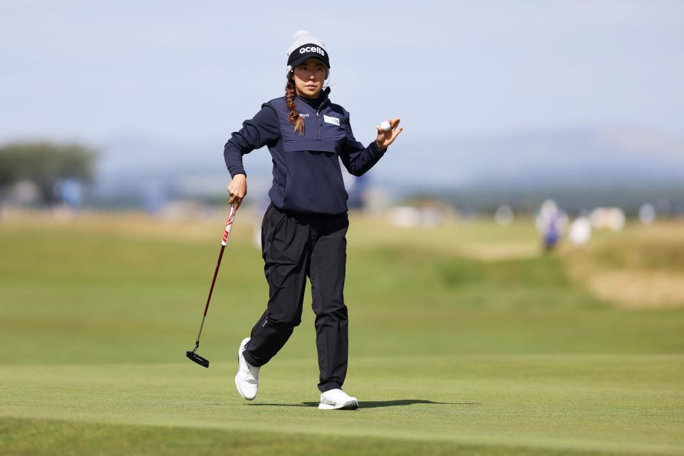 ST ANDREWS, SCOTLAND - AUGUST 22: Jenny Shin of South Korea acknowledges the crowd on the 17th green during Day One of the AIG Women's Open at St Andrews Old Course on August 22, 2024 in St Andrews, Scotland. (Photo by Charlie Crowhurst/R&A/R&A via Getty Images)