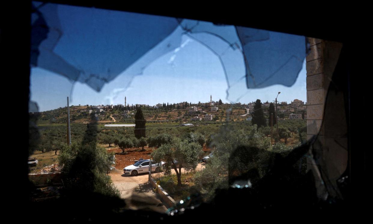 <span>File photo of a Palestinian village after a settler attack. Australia has announced sanctions against seven Israeli settlers and Hilltop Youth.</span><span>Photograph: Mohamad Torokman/Reuters</span>