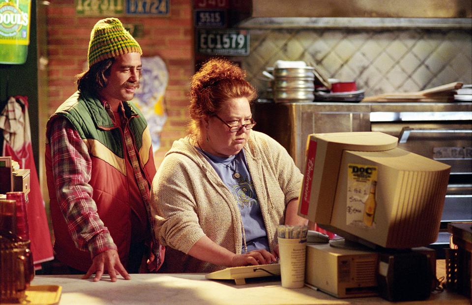 (L-R) Peter Dante and Conchata Ferrell in a scene from the 2002 Adam Sandler comedy "Mr. Deeds." Dante and his reggae band Chosen Family will be performing at Live Wire Athens on June 9, 2022, with Athens area hip-hop artist Tyl3r Davis.