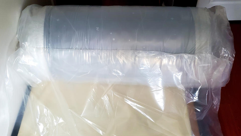 Casper Wave Hybrid Snow review: mattress rolled up in plastic