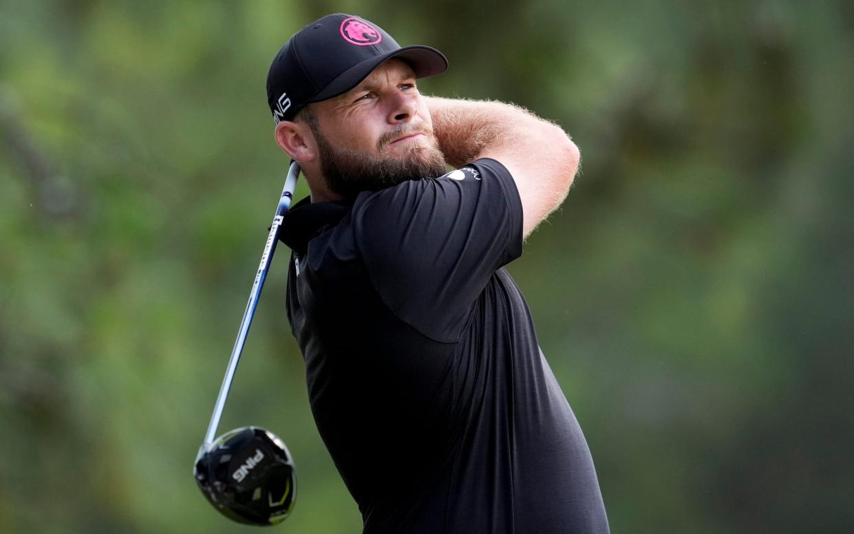 Tyrrell Hatton, of England, watches his tee shot on the second hole during the first round of the U.S. Open golf