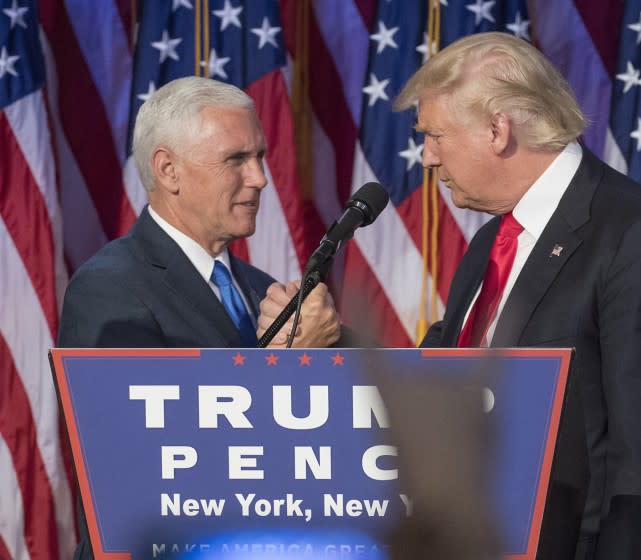 President-elect Donald Trump, joined on stage by running mate Mike Pence, speaks to supporters at the Election Night Party at the Hilton Midtown Hotel in New York City on Wednesday, Nov. 9, 2016. (J. Conrad Williams Jr./Newsday/TNS) ** OUTS - ELSENT, FPG, TCN - OUTS **