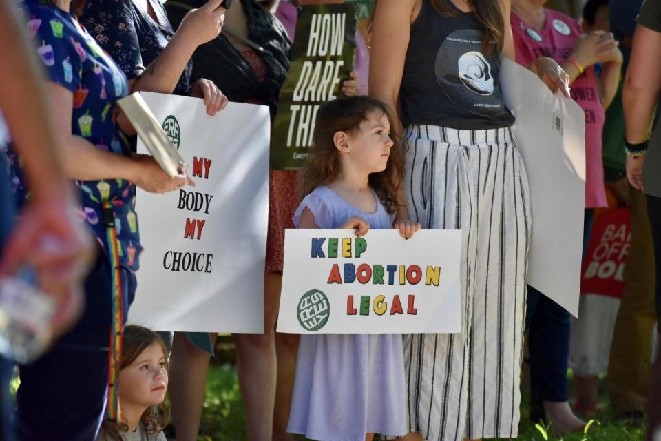 Hundreds of abortion rights activists gathered in Innes Park near Thalian Hall in downtown Wilmington Friday, June 24, 2022, following the U.S. Supreme Court's decision that overturned Roe v. Wade and eliminated the constitutional right to an abortion for Americans.