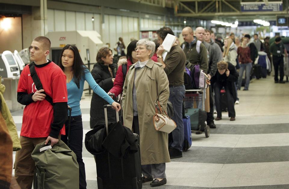 Delayed passengers should be looked after by their airline - Credit: GETTY