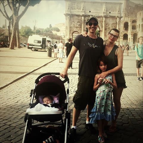 <p>Milla Jovovich Instagram</p> Milla Jovovich, Paul W. S. Anderson, Ever Anderson, and Dashiel Edan Anderson in Rome.