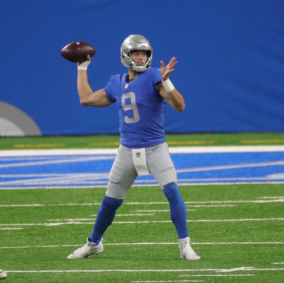 Lions quarterback Matthew Stafford passes against the Texans during the first half at Ford Field on Thursday, Nov  26, 2020.