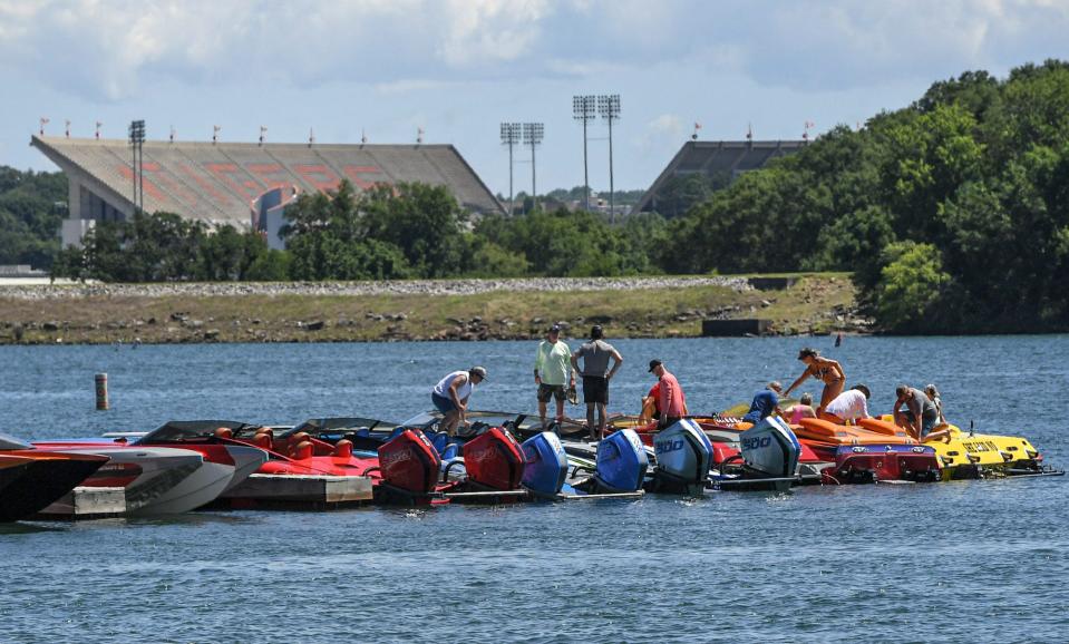 Boats dock at Clemson Marina, across the Seneca River portion of the lake from Clemson Memorial Stadium, during the fun run element of the Hartwell Lake Charity Run, from Green Pond Landing to Clemson Marina, Friday, June 7, 2024