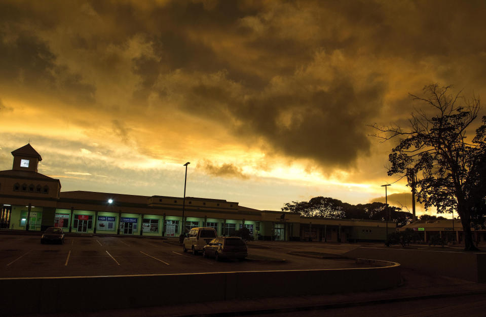 Storm clouds gather as Tropical Storm Dorian moves toward St. Michael Parish, Barbados, Monday, Aug. 26, 2019. Much of the eastern Caribbean island of Barbados shut down on Monday as Dorian approached the region and gathered strength, threatening to turn into a small hurricane that forecasters said could affect the northern Windward islands and Puerto Rico in upcoming days. (AP Photo/Chris Brandis)