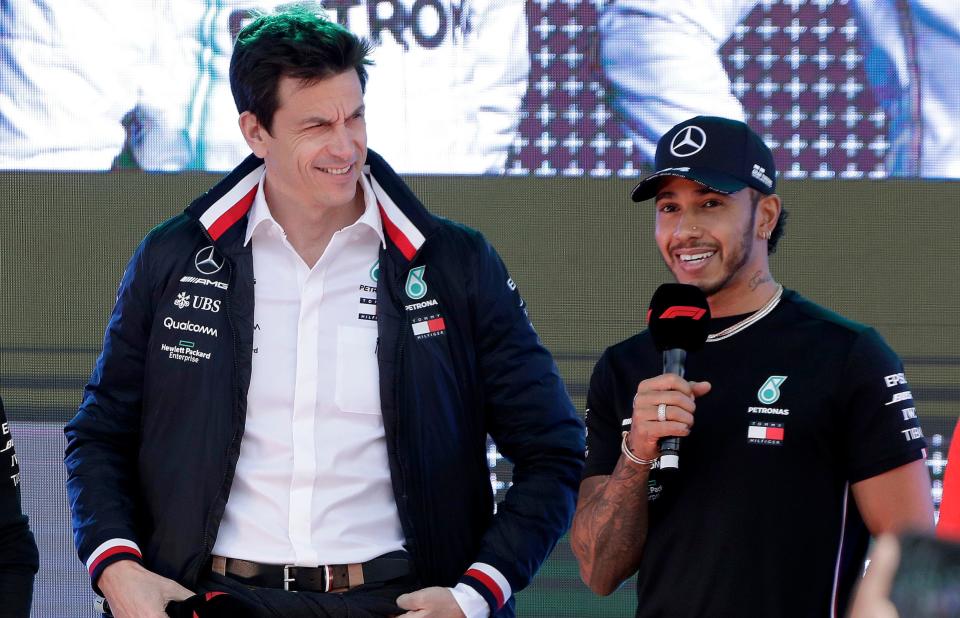 Toto Wolff and Lewis Hamilton speak to the media.