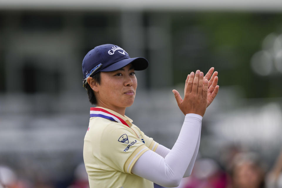 Yuka Saso, of Japan, acknowledges the crowd after winning the U.S. Women's Open golf tournament at Lancaster Country Club, Sunday, June 2, 2024, in Lancaster, Pa. (AP Photo/Matt Rourke)