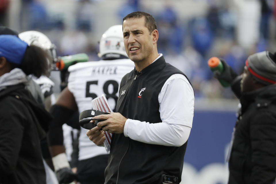 Cincinnati head coach Luke Fickell watches from the sideline in the first half of an NCAA college football game against Memphis Friday, Nov. 29, 2019, in Memphis, Tenn. (AP Photo/Mark Humphrey)