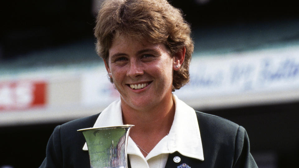 Lyn Larsen, pictured here with the Women's Cricket World Cup trophy in 1988. 