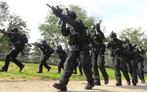 South Korea's Capital Defense Command soldiers take part in a military drill in Seoul  - Credit: STR/AFP