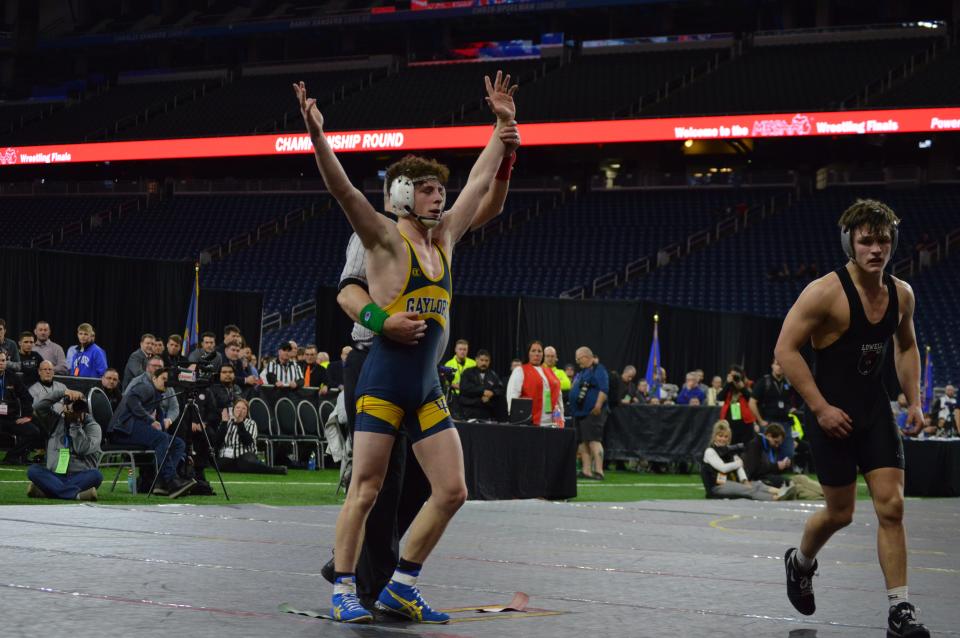 Louden Stradling (right) celebrates state championship victory over Ramsy Mutschler (left).
