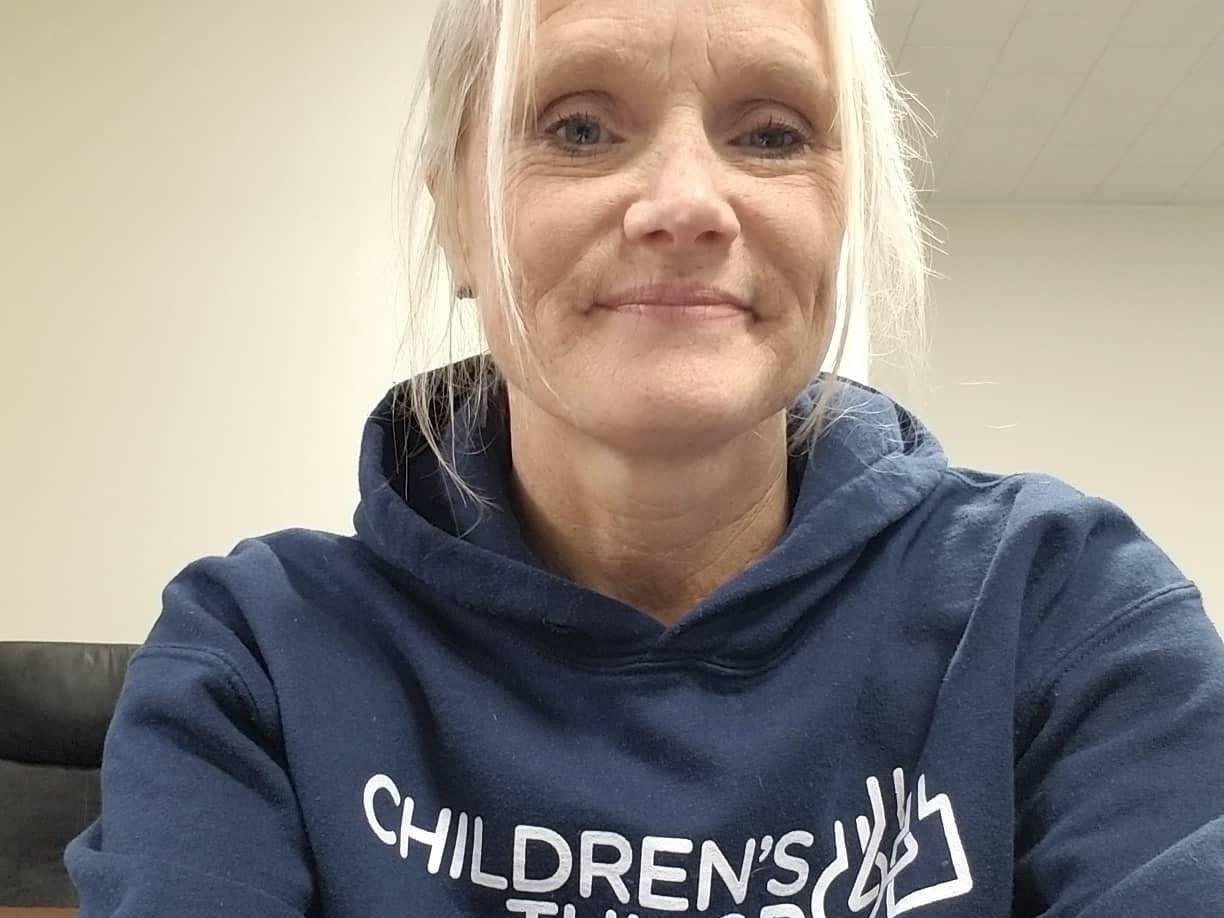 Michelle Holbrook wearing a Children's Tumor Foundation hoodie