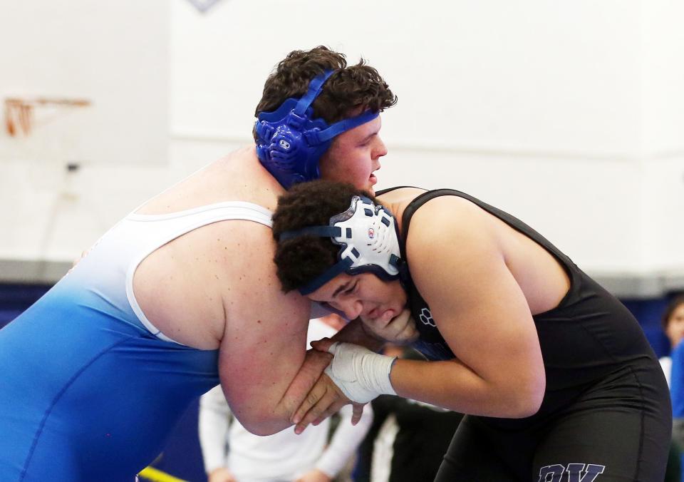 Hendrick Hudson's Mason Dietz on his way to defeating  Putnam Valley's Jaden Tesher in the 285-pound weight class during the Section 1 Division II wrestling championships at Hendrick Hudson High School in Montrose Feb. 11, 2023. 