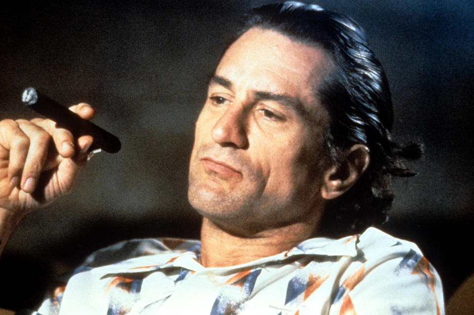 Robert De Niro smokes a cigar in a scene from the film  'Cape Fear', 1991. (Photo by Universal/Getty Images)