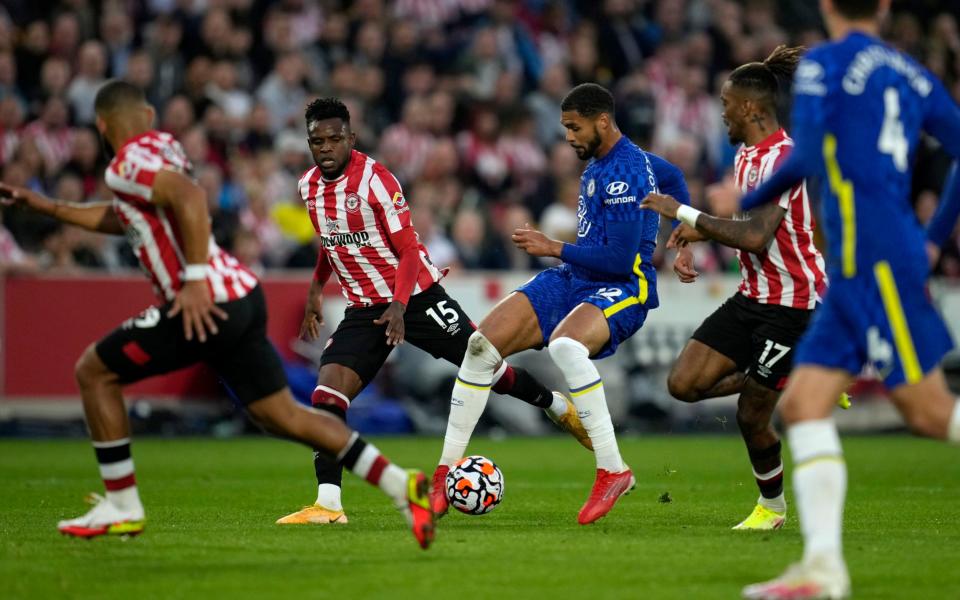 Chelsea's Ruben Loftus-Cheek, center, controls the ball during the English Premier League - AP