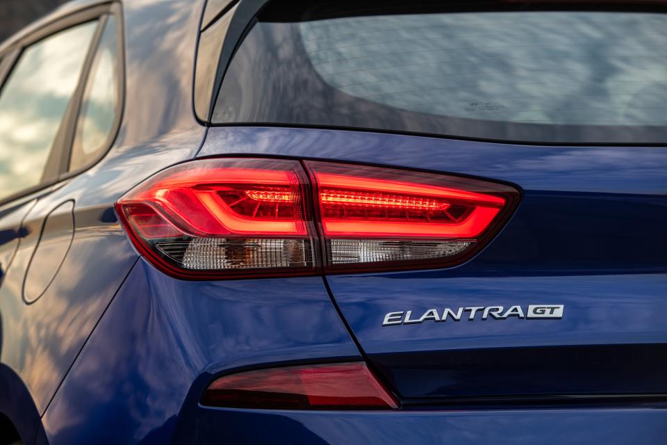 <p>At first glance, it might seem that the new 2019 Hyundai Elantra GT N Line is merely an appearance package that imitates the brand's N performance models, but it actually replaces <a rel="nofollow noopener" href="https://www.caranddriver.com/hyundai/elantra-gt-sport" target="_blank" data-ylk="slk:the existing Elantra GT Sport;elm:context_link;itc:0;sec:content-canvas" class="link ">the existing Elantra GT Sport</a> in the Elantra lineup as the hottest version of Hyundai's Europe-derived hatchback (known as the i30 overseas) that is available to us Americans. While that GT Sport model looked nearly identical to <a rel="nofollow noopener" href="https://www.caranddriver.com/hyundai/elantra-gt" target="_blank" data-ylk="slk:the regular non-turbo Elantra GT;elm:context_link;itc:0;sec:content-canvas" class="link ">the regular non-turbo Elantra GT</a>, the new N Line trim does bring more aggressive body styling that is taken from <a rel="nofollow noopener" href="https://www.caranddriver.com/reviews/2018-hyundai-i30-n-first-drive-review" target="_blank" data-ylk="slk:the Euro-only i30 N hot hatch;elm:context_link;itc:0;sec:content-canvas" class="link ">the Euro-only i30 N hot hatch</a>-and it brings real performance modifications, too.</p>