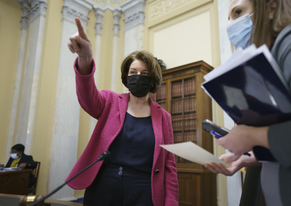 Senate Rules Committee Chair Amy Klobuchar, D-Minn., holds a hearing on the "For the People Act," which would expand access to voting and other voting reforms, at the Capitol in Washington, Wednesday, March 24, 2021. The bill has already passed in the House. (AP Photo/J. Scott Applewhite)