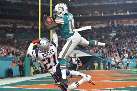 Cutler, Dolphins snap Patriots' eight-game win streak