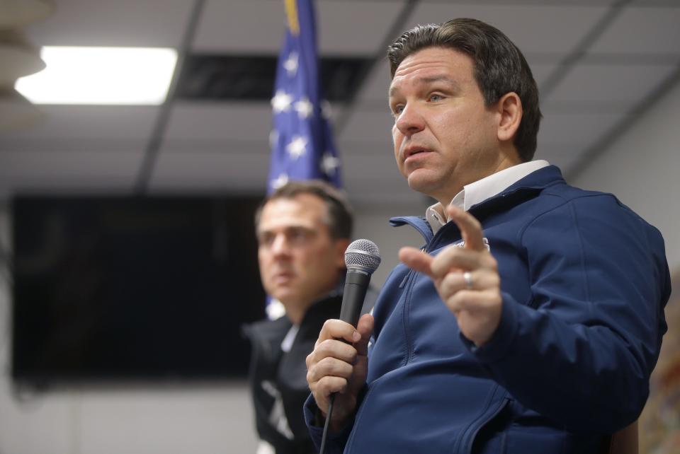 Ron DeSantis speaks to a crowd while campaigning ahead of the caucus Thursday, Dec. 21, 2023 at American Legion Post 721 in Coralville, Iowa.