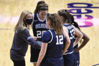 Villanova head coach Denise Dillion talks to her team during the second half of an NCAA college basketball game against DePaul in the quarterfinals of the Big East Conference tournament at Mohegan Sun Arena, Saturday, March 6, 2021, in Uncasville, Conn. (AP Photo/Jessica Hill)